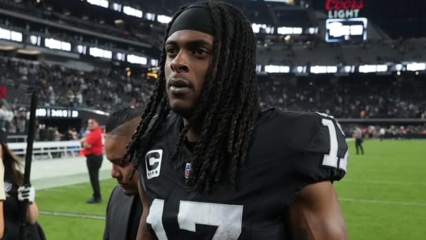 Raiders receiver Davante Adams walks off the field after a game.